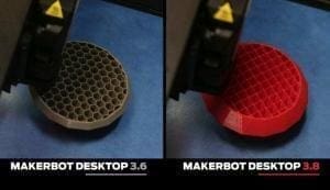 Impressora imprimindo modelos em 3D da Makerbot. Um modelo na cor cinza e outro na cor vermelha.